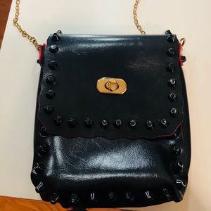 Black patent leather cross body bag